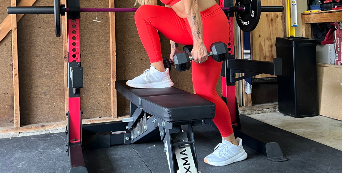 Woman doing step ups on a bench