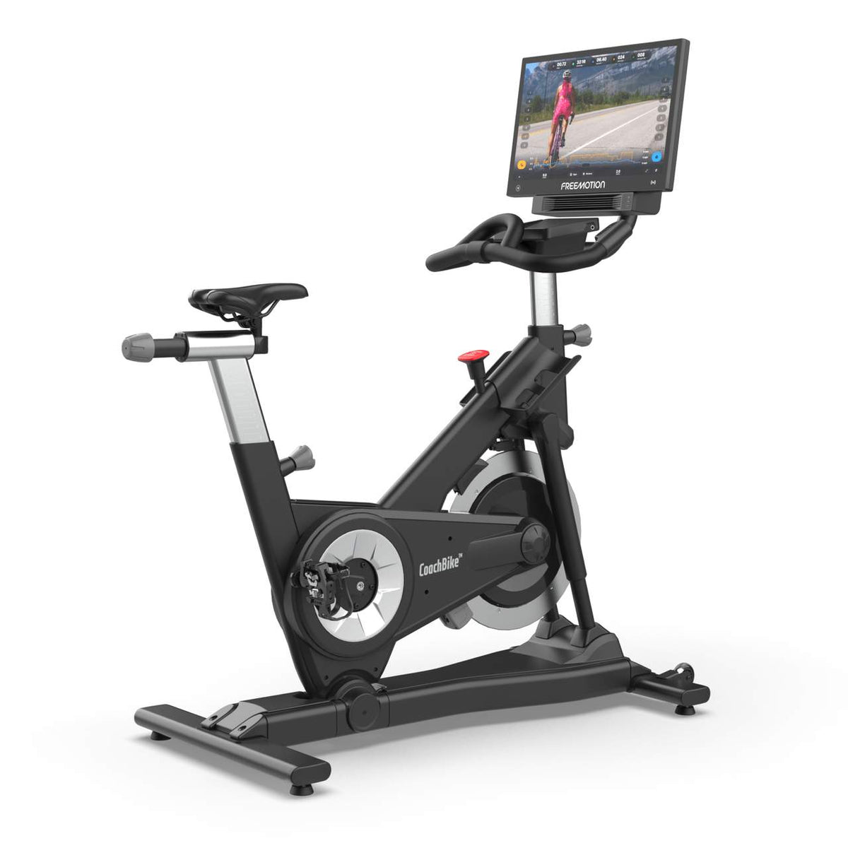 Freemotion b24 CoachBike commercial exercise bike shown from a three-quarter angle with its 24-inch HD touchscreen