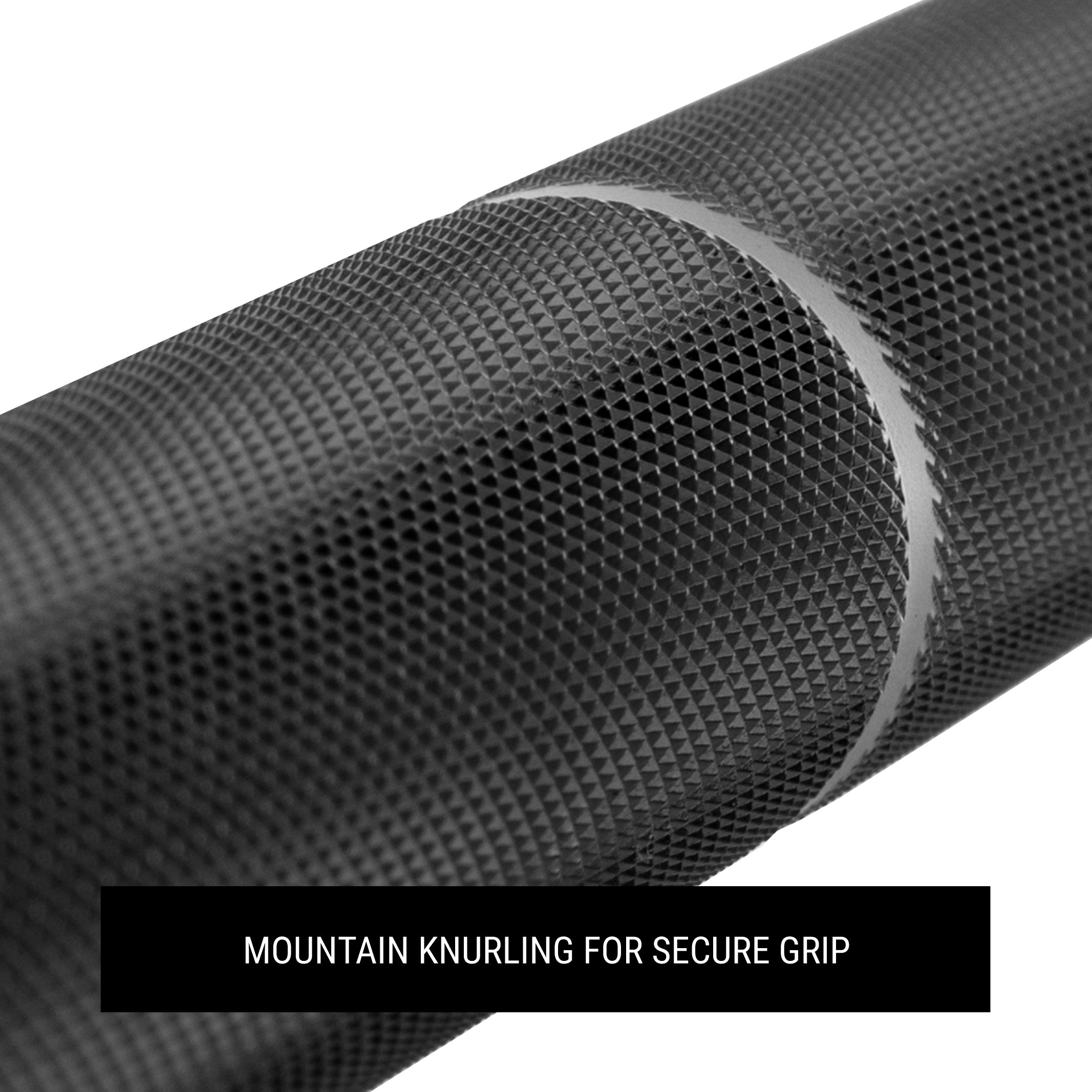 Close up of mountain knurling on black barbell